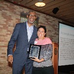 Ms. Gail Zemmol receives award from Dean Grant